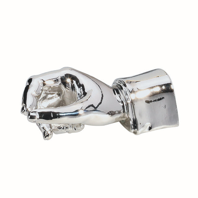 Support main chrome Enzo Varini disposé sur un fond blanc.